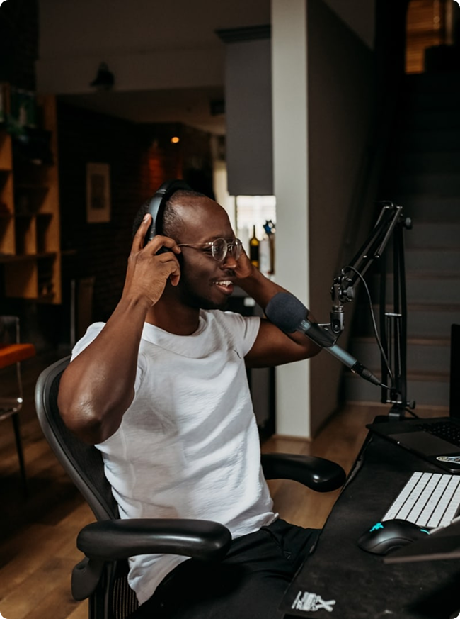 
A guy with headphones listening to music